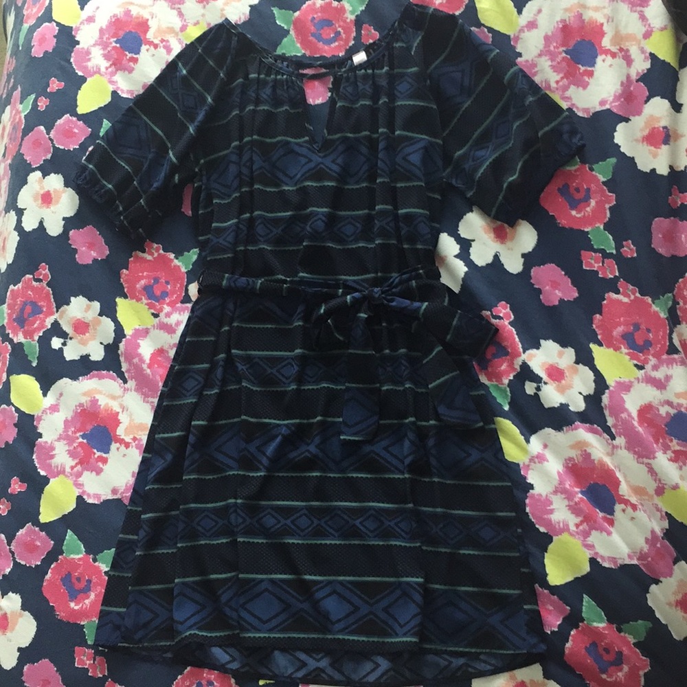 Please note, size has faded away, is either M or L